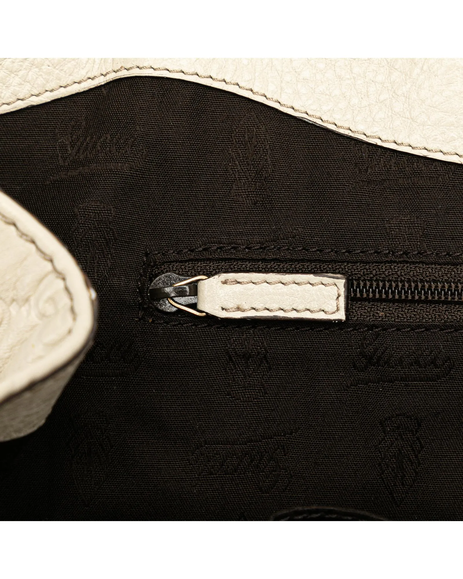 Embossed Leather Tote Bag with Magnetic Snap Closure and Interior Pockets