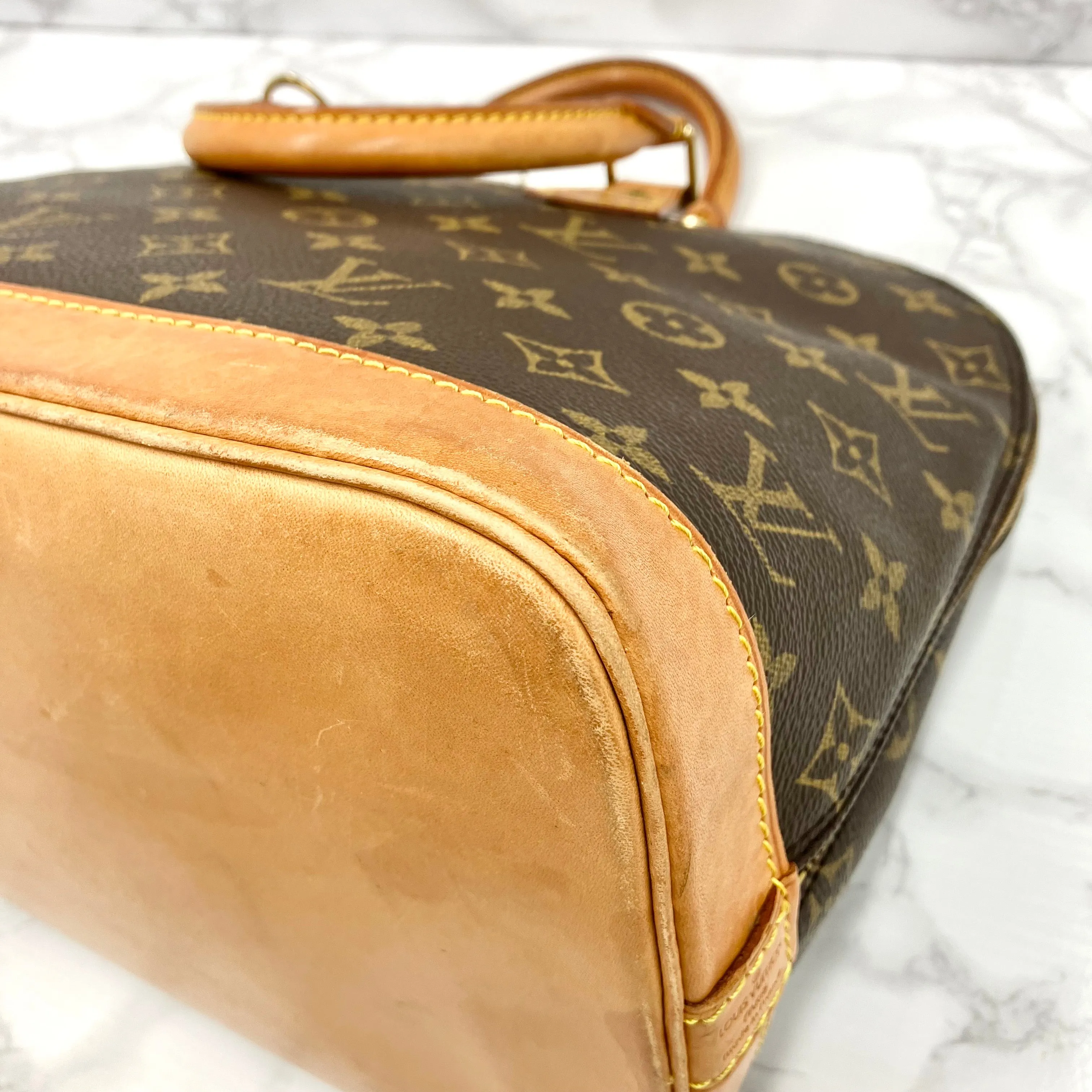 LOUIS VUITTON Monogram Alma PM