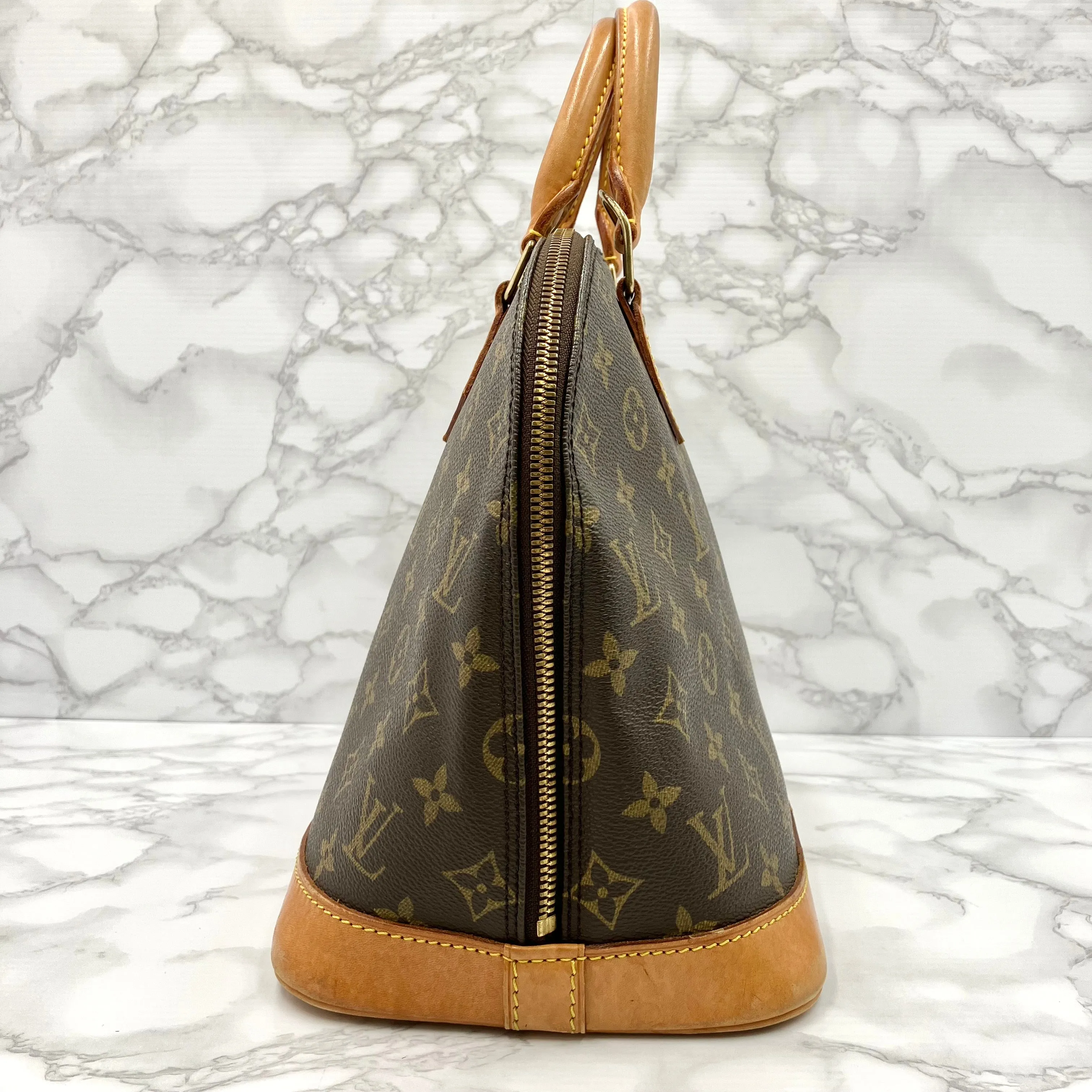 LOUIS VUITTON Monogram Alma PM