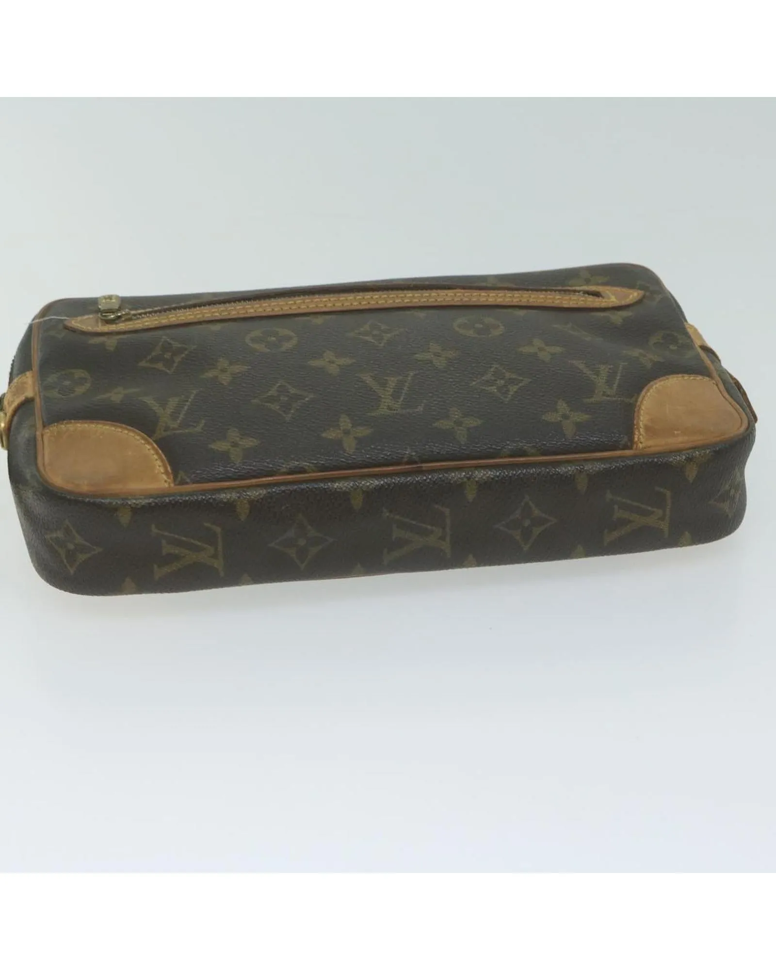 Monogram Canvas Clutch with Dragonne Strap by Louis Vuitton