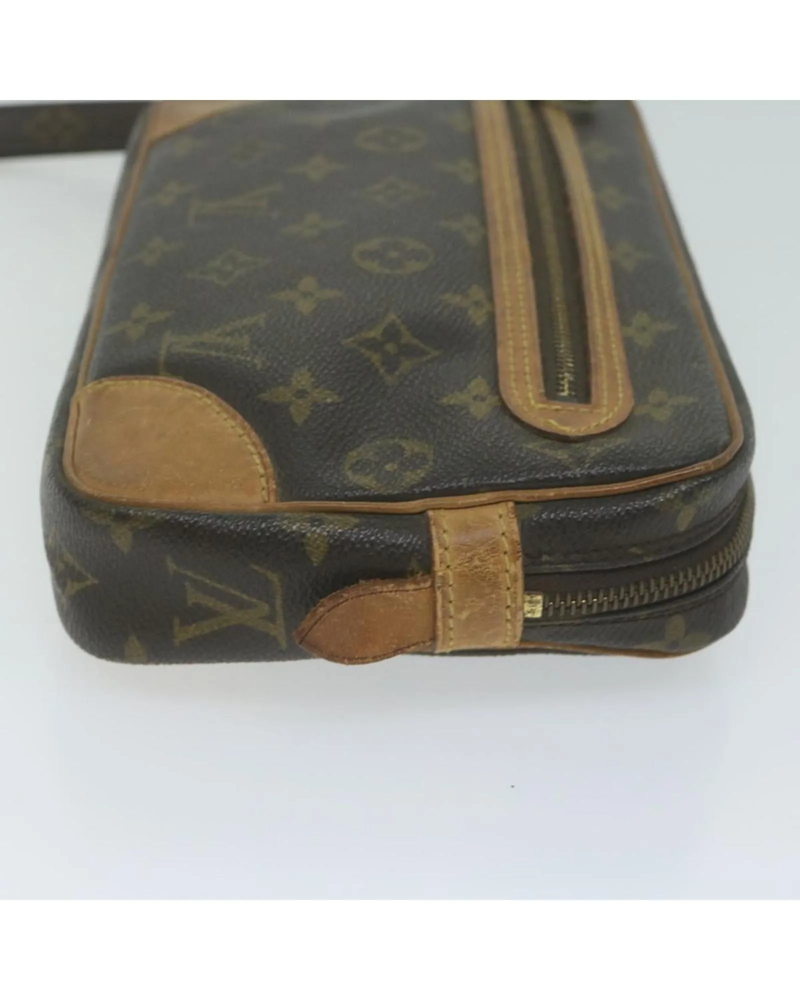 Monogram Canvas Clutch with Dragonne Strap by Louis Vuitton