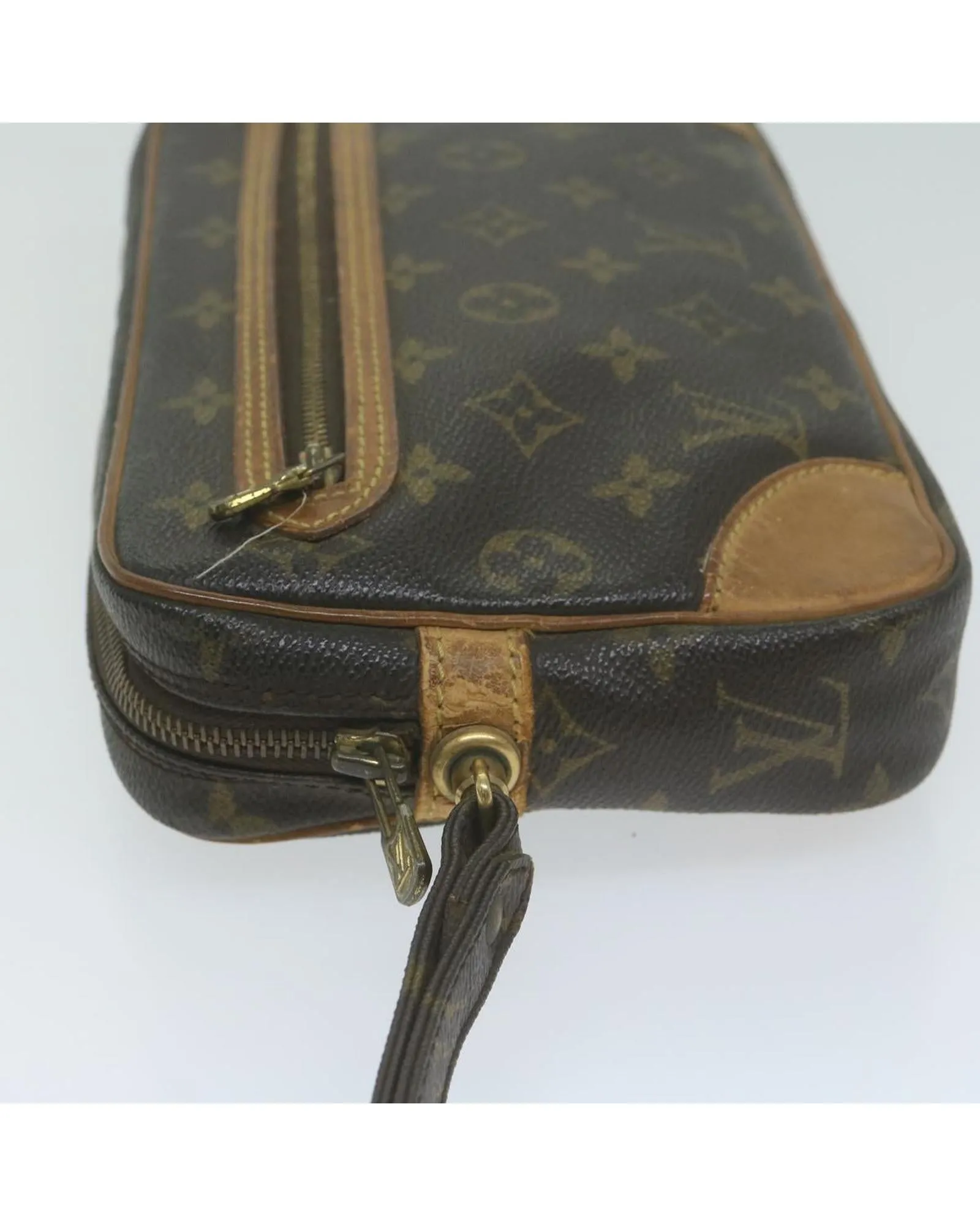 Monogram Canvas Clutch with Dragonne Strap by Louis Vuitton