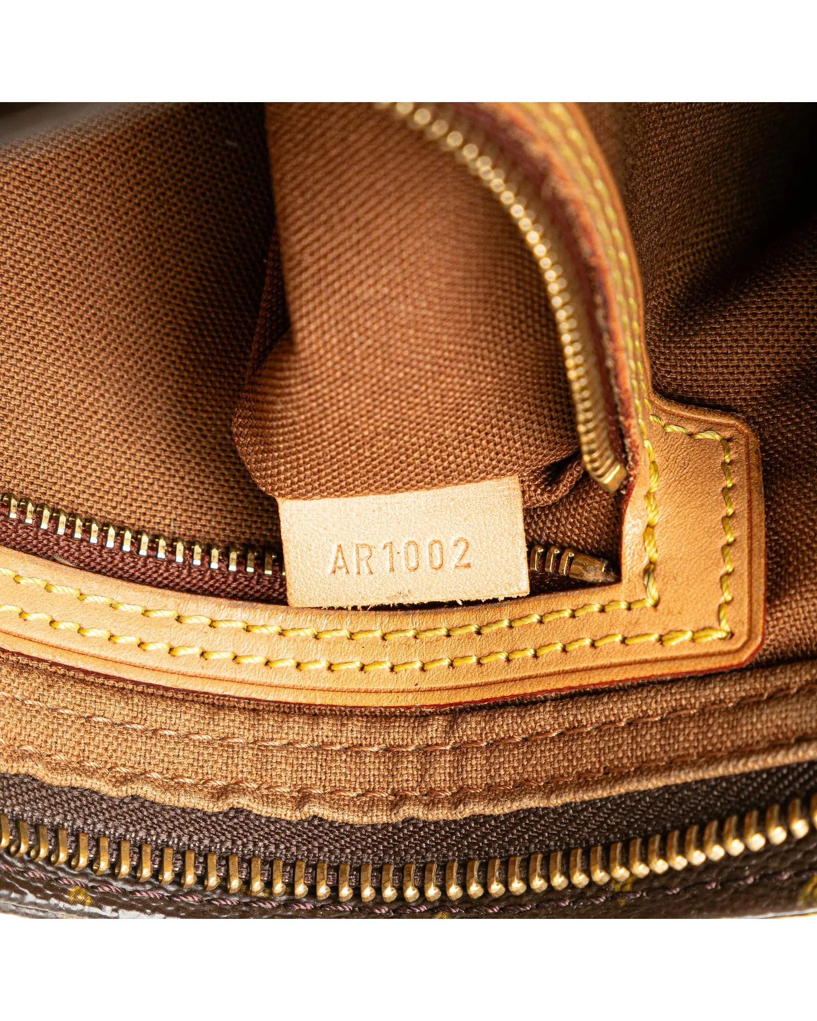 Monogram Canvas Trotteur with Vachetta Leather Trim